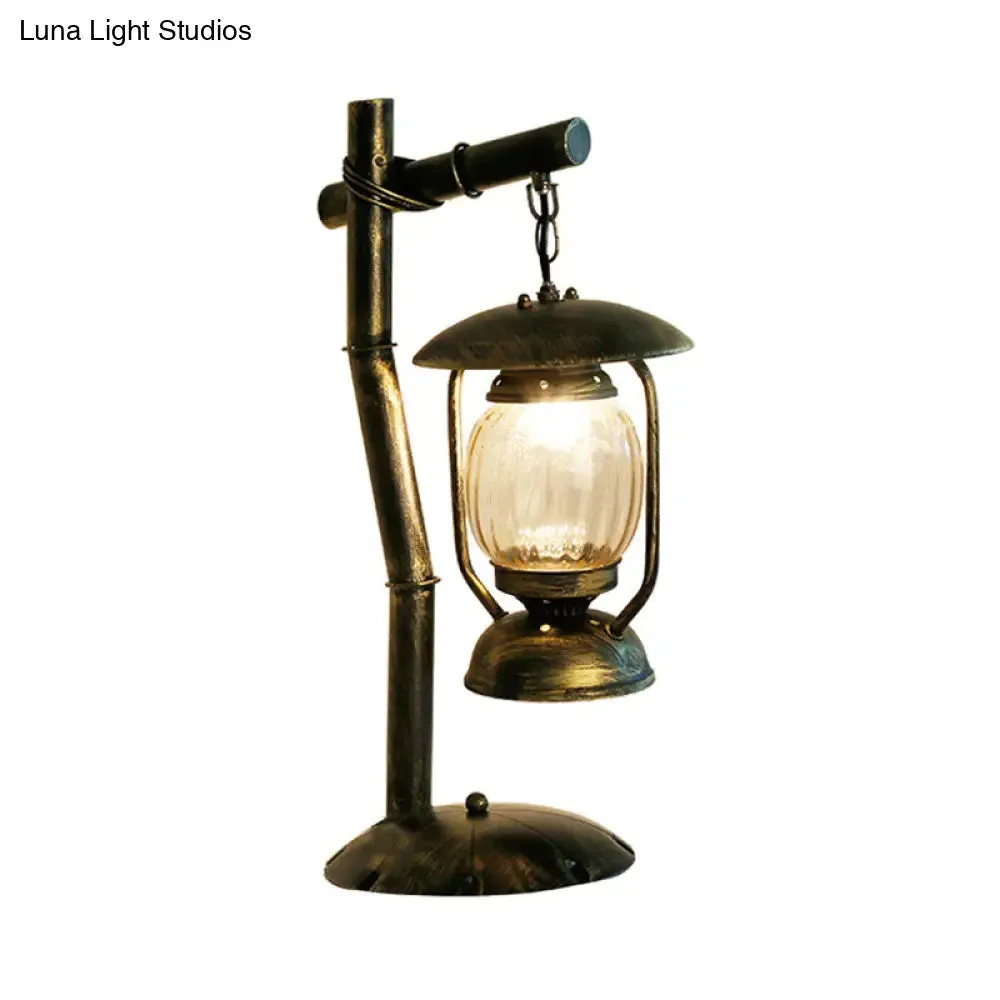 Factory Clear Glass Kerosene Bedroom Desk Light: 1-Light Brass Finish Table Lamp with Metal Angled Arm