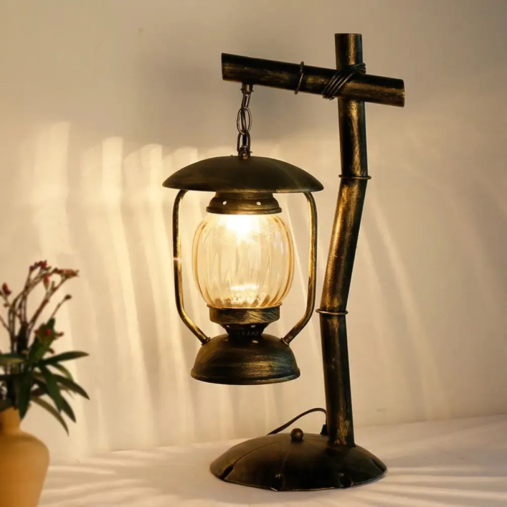 Factory Clear Glass Kerosene Bedroom Desk Light: 1-Light Brass Finish Table Lamp with Metal Angled Arm