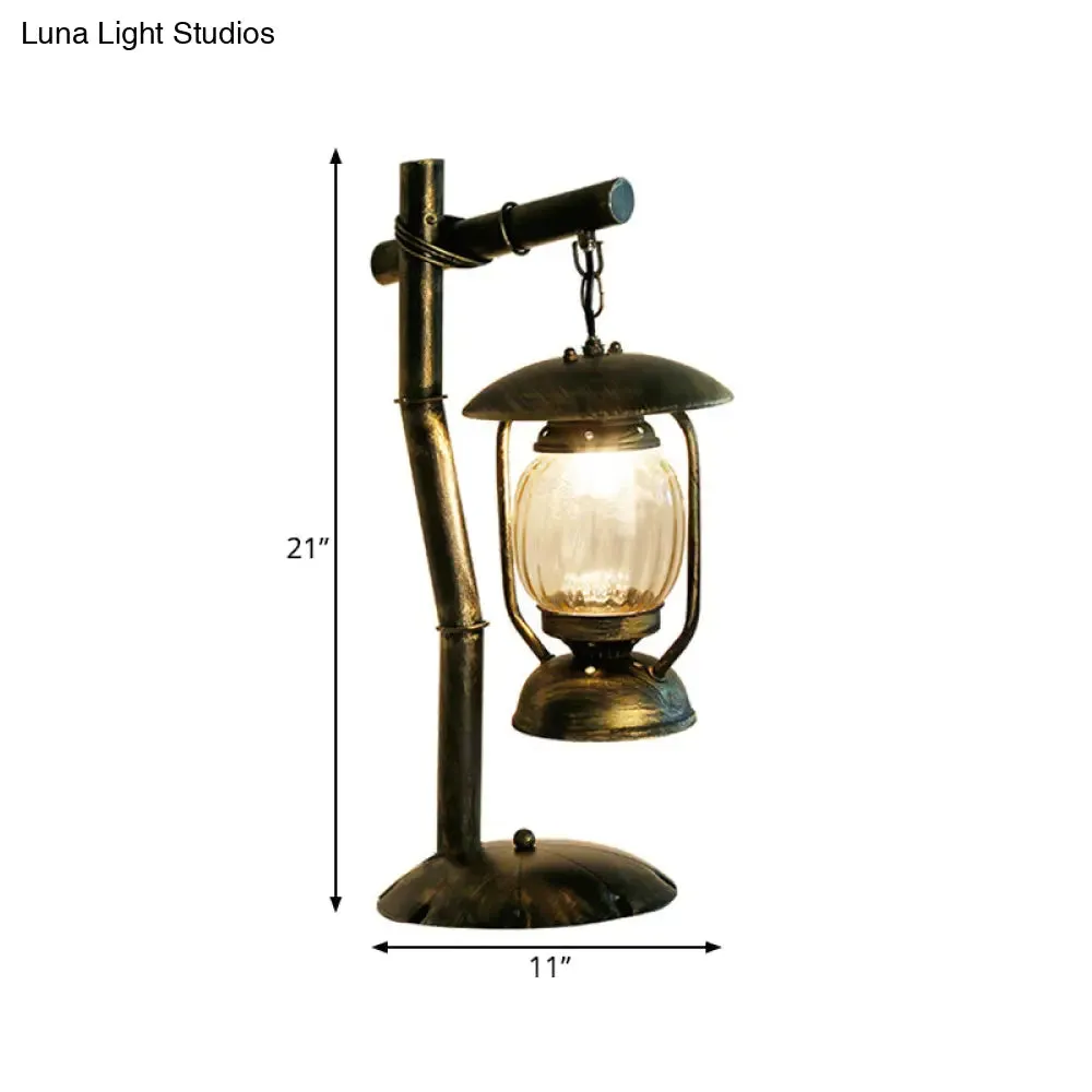 Factory Clear Glass Kerosene Bedroom Desk Light: 1-Light Brass Finish Table Lamp with Metal Angled Arm